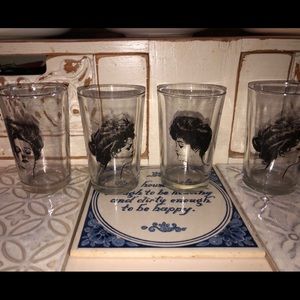Vintaged set 4 clear lady faces juice glasses
